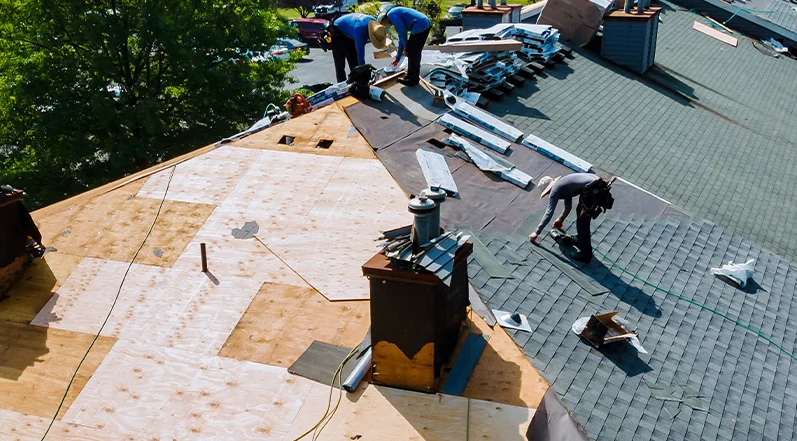 Commercial roofing installation on a large building